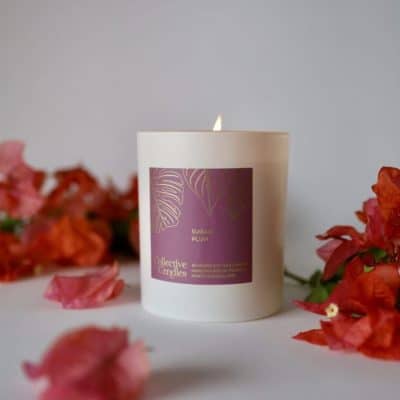 Lavender-scented soy candle with floral packaging, perfect for home fragrance and relaxation.