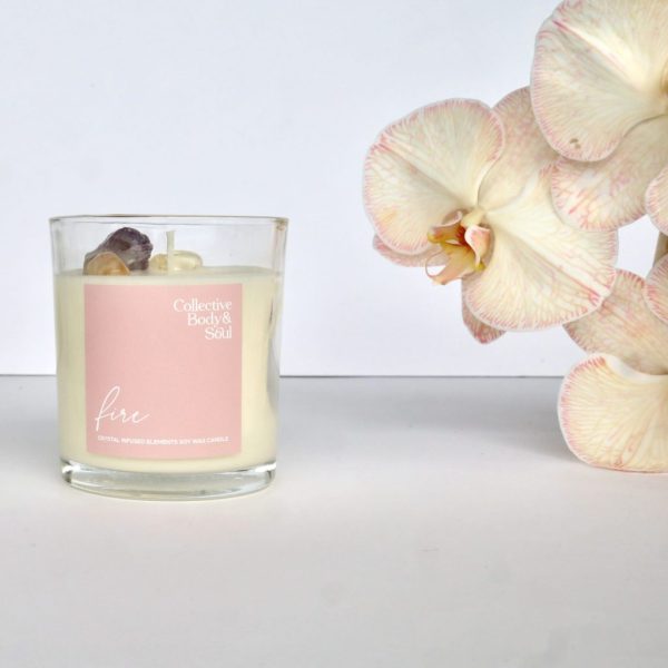 Elegant candle with orchid flowers, perfect for creating a calming ambiance and floral home decor.