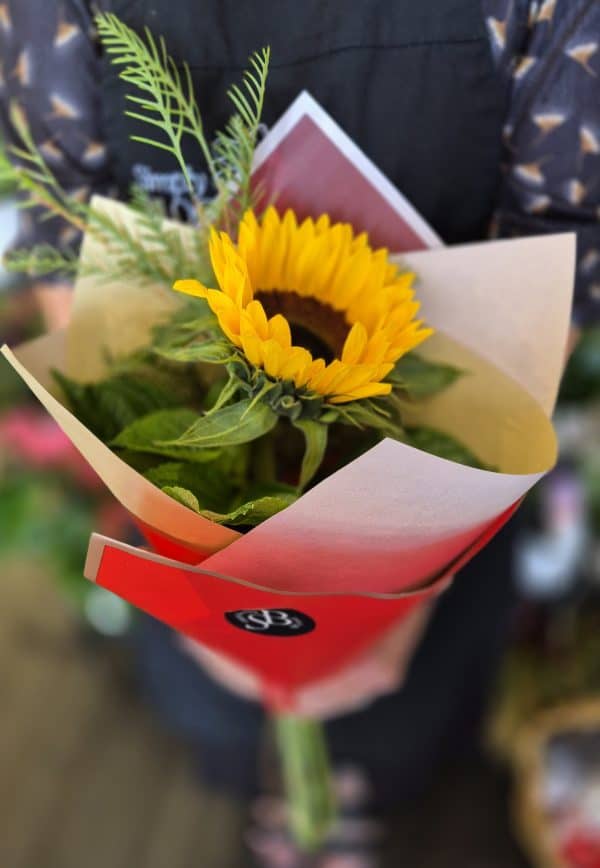 Sunflower wrapped with greenery - Image 2