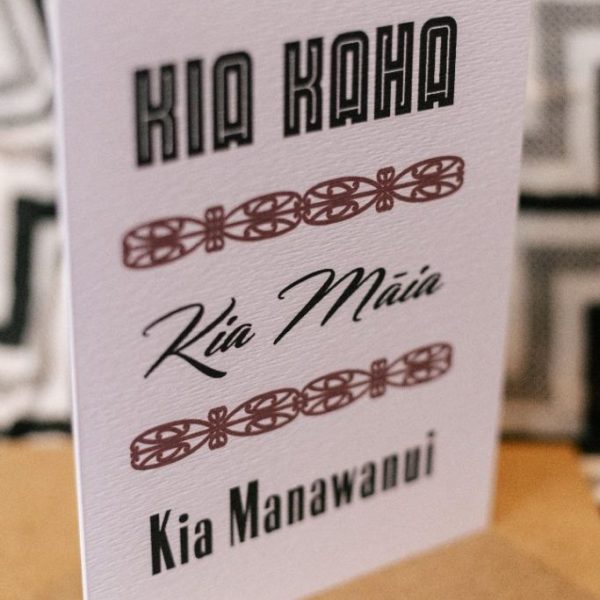A Maori welcome sign for a wedding or event, featuring traditional Kia Kaha and Kia Manawaroa, with a Maori pattern.