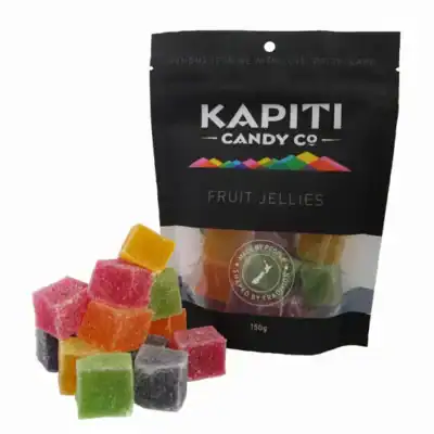 Rainbow fruit jellies in colourful cubes with Kapiti Candy Co packaging, NZ-made sweet treats.