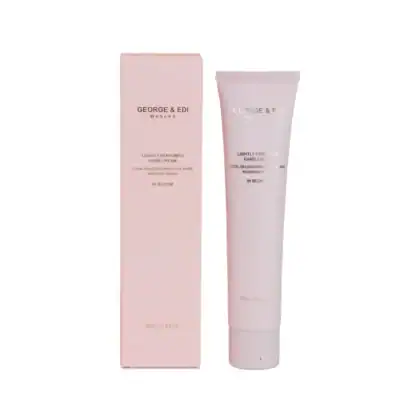 Gentle pink hand cream in a tube with floral packaging for soft, hydrated hands.