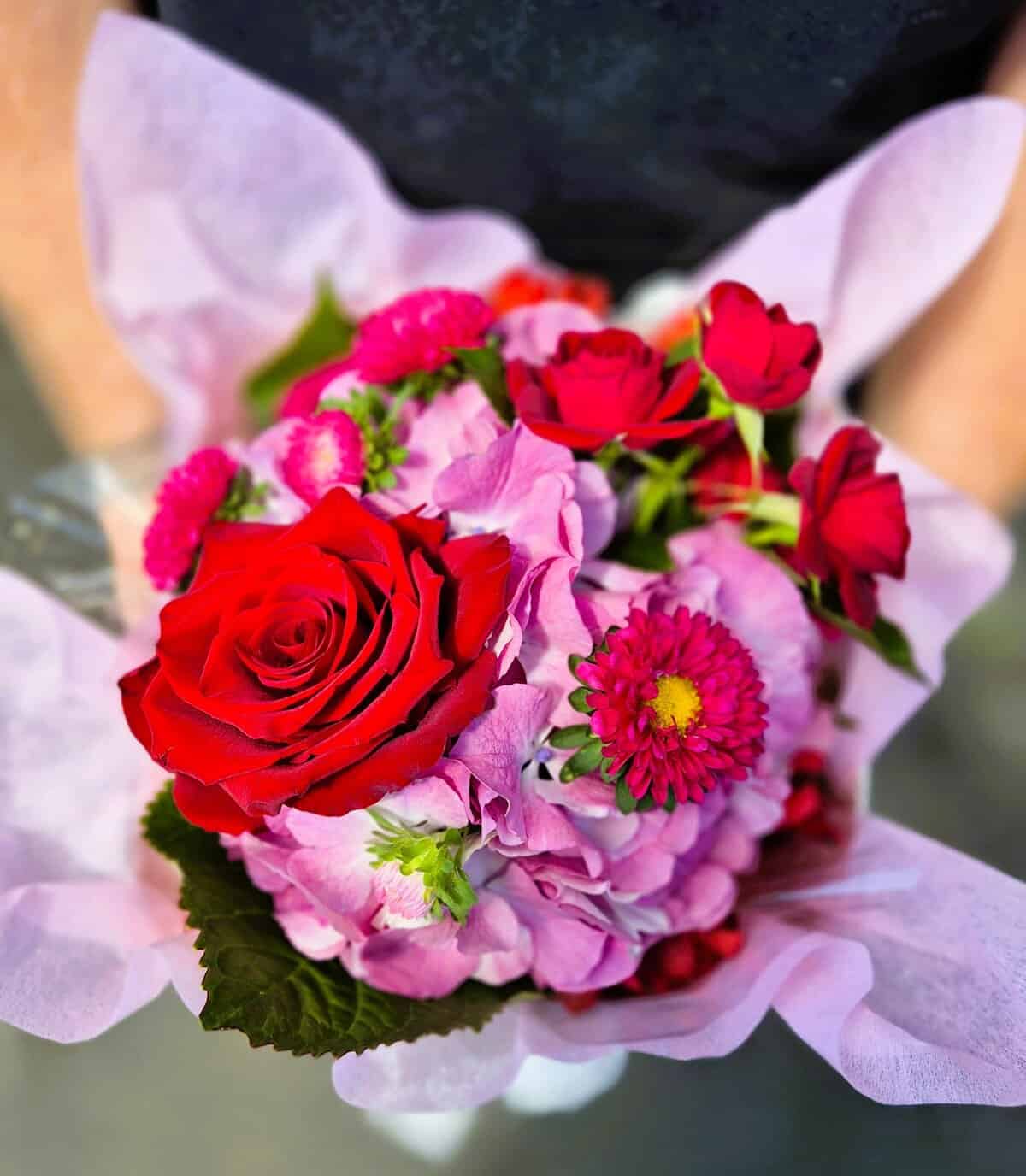 Beautiful mixed flower bouquet featuring roses, chrysanthemums, and garden flowers, perfect for gifting or decor.