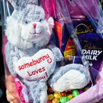 Adorable plush bunny gift with chocolates, perfect for Easter celebrations and expressing love.