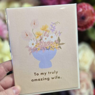 Floral greeting card with pastel flowers and a heartfelt message for your wife.