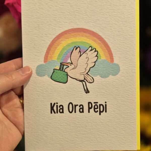 Kia Ora Pēpi TenCards featuring a stork with rainbow and clouds.