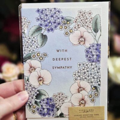 Beautiful floral greeting card featuring pastel hydrangeas and orchids for special occasions.