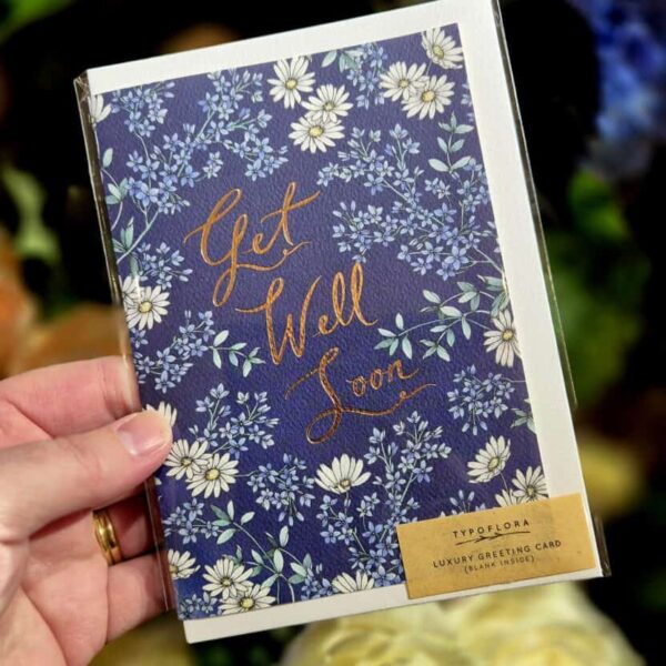 Beautiful floral "Get Well Soon" greeting card, perfect for sending wishes of health and recovery.