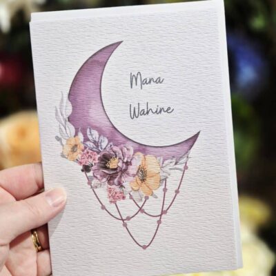 Moon and floral wedding invitation card with personalized names.