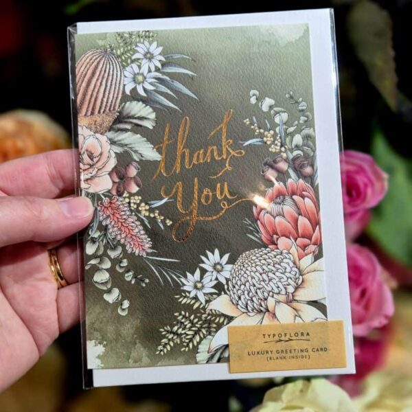 Elegant floral thank you card featuring detailed botanical artwork, ideal for special occasions.
